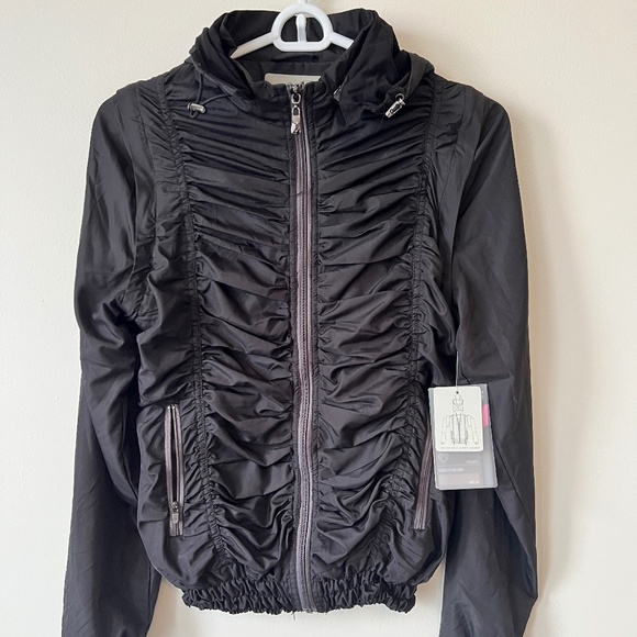 New with tags. Colosseum 4 way adjustable jacket size small. - Picture 1 of 5